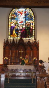 Grace Church Canton - Bishop Love Preparing Communion